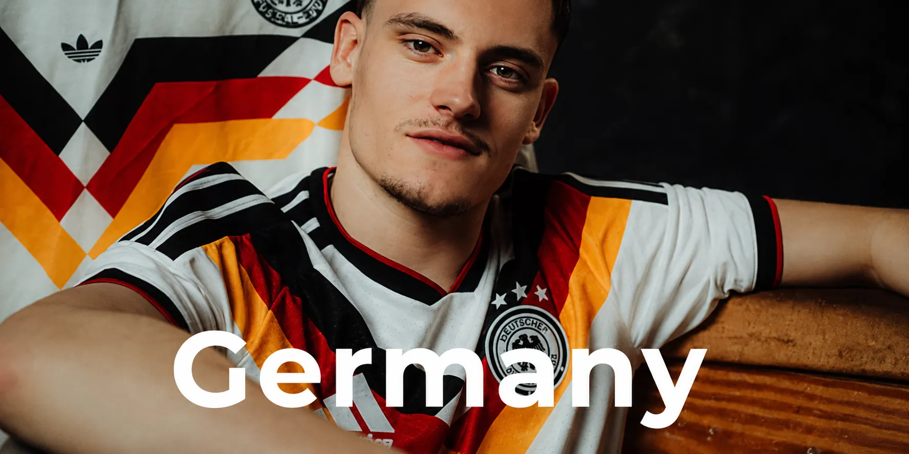 Germany football jersey with player on national team kit background