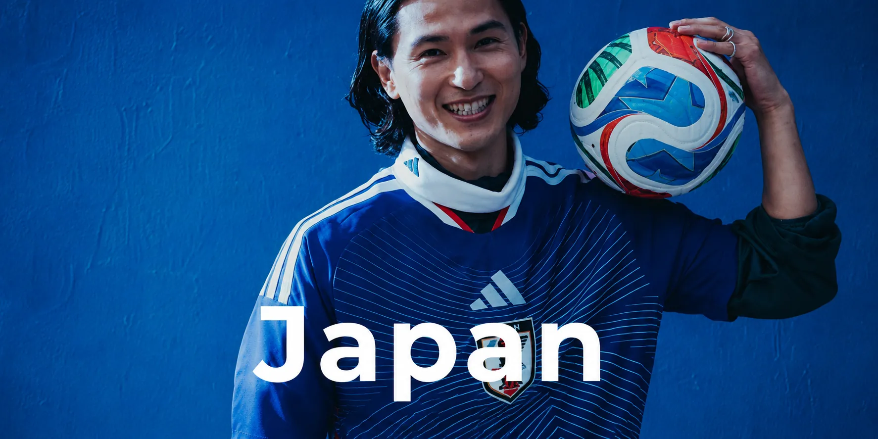 Japan football jersey with player on blue kit background