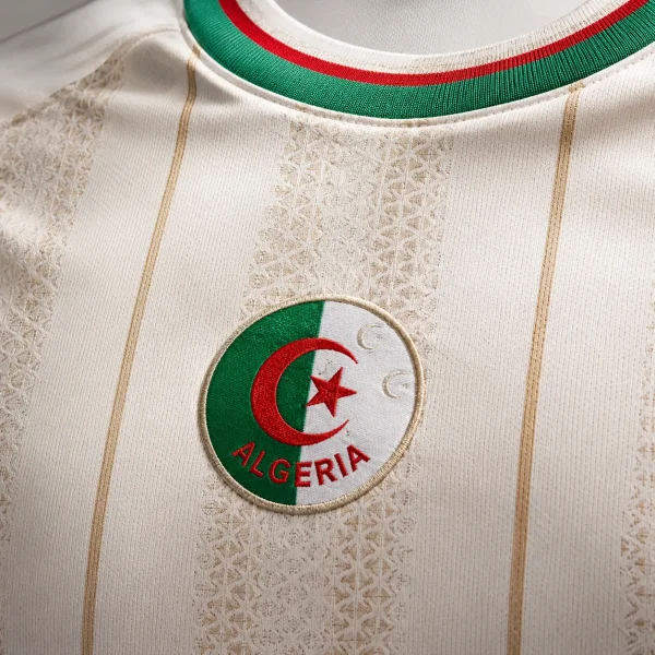 Algeria football crest on white jersey fabric background