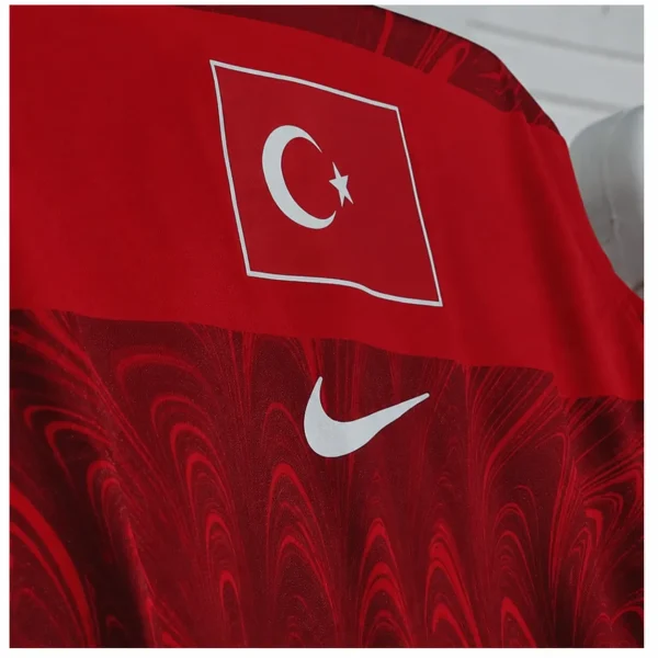 Turkey football flag on red jersey fabric background