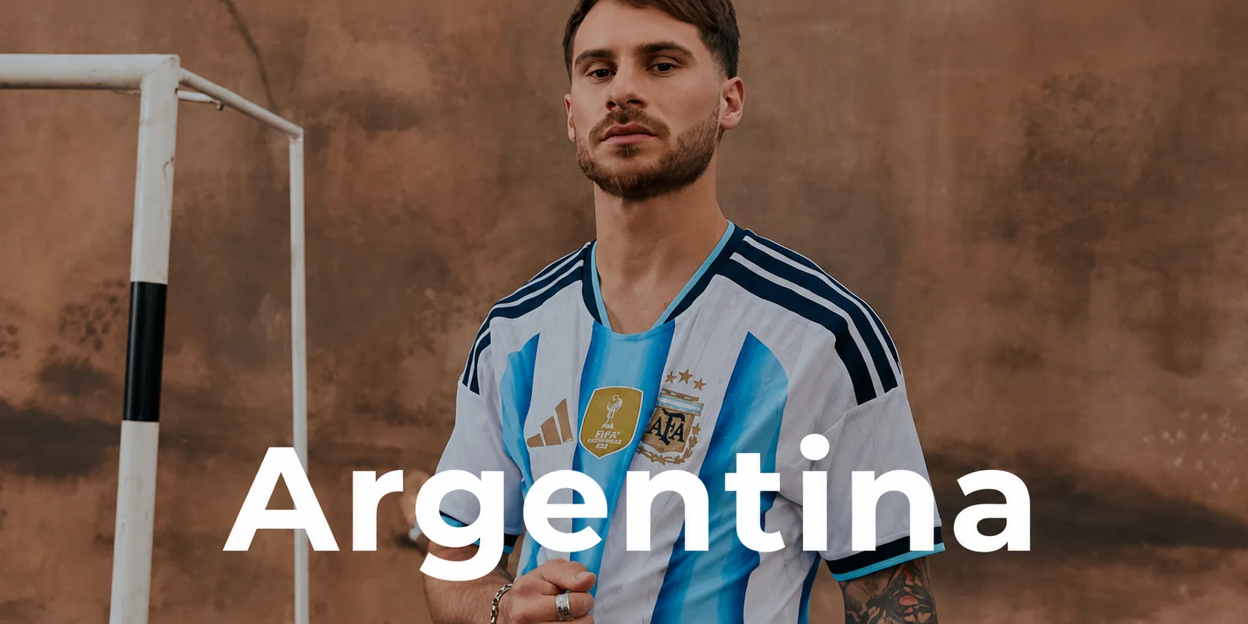 Argentina football jersey with player on blue and white kit background